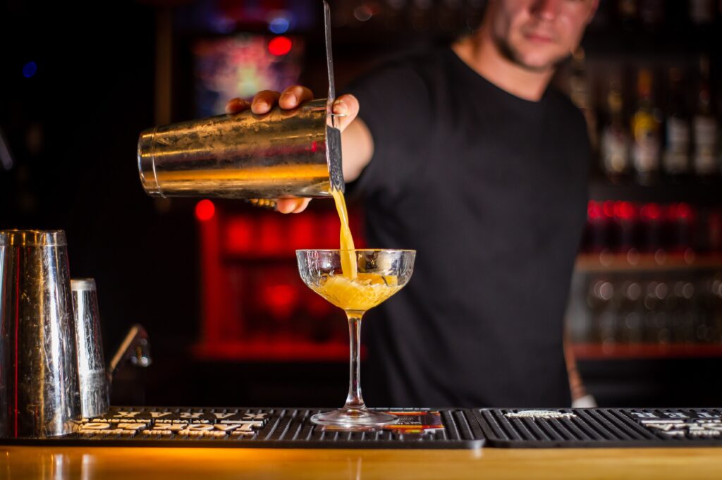 bartender pouring a drink